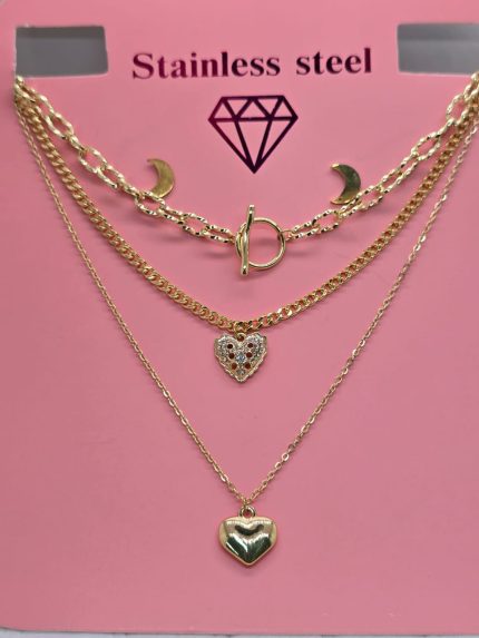 collare de tres caidas con dos dijes de corazones